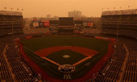 ‘It was kind of orange’: Chicago White Sox game in New York is postponed because of ‘clearly hazardous’ air from Canadian wildfires