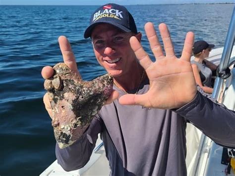 ‘Mind blown’: Boat captain finds fossilized megalodon tooth in Gulf of Mexico off Sarasota County