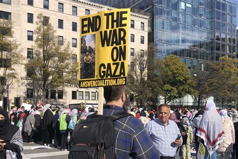‘We’re not complicit in this war’: Thousands march in DC in support of Palestine, demand cease-fire