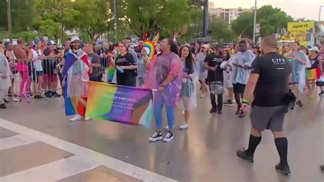 ‘We’re still here’: Stormy weather no obstacle for thousands coming out to Stonewall Pride Parade