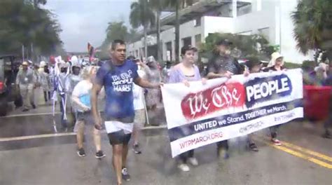 ‘We the People’ March: Rain no obstacle for hundreds in Fort Lauderdale protesting new Florida, US laws