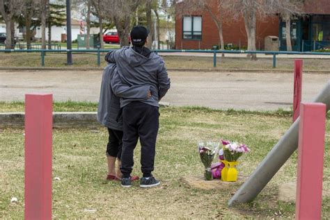 ‘Why?’ Mother and child fatally stabbed outside Edmonton school, police shoot suspect