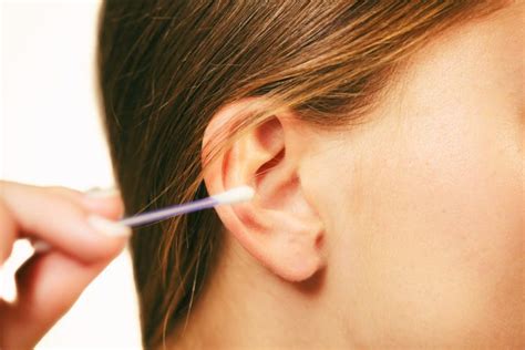  Never stick the cotton swab into the actual ear canal