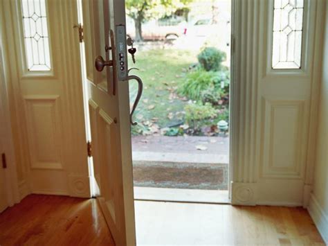  Open the door slightly just for you to be able to stand in the opening, exercise standing there in front of your dogs while your dogs are still in the house for 1 minute increase by 1 minute daily until your dogs understand and wait patiently for 3 minutes without trying to trip you or escape first