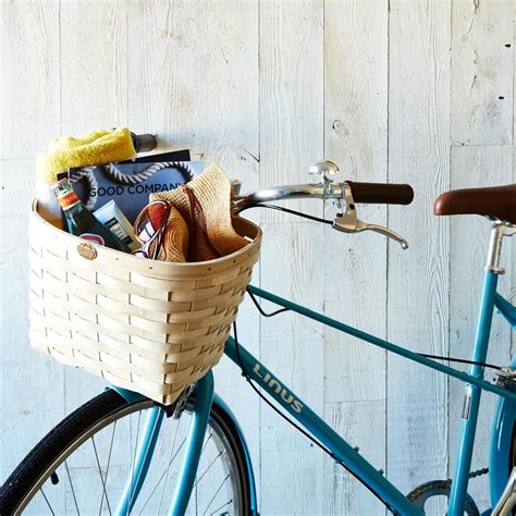  They fit perfectly in adorable bike baskets where they can enjoy passing scenery