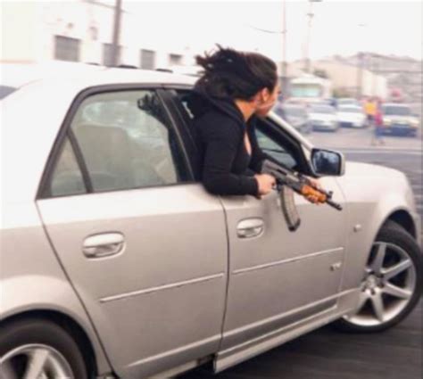 1 arrested in connection to viral photo of woman flashing AK-47