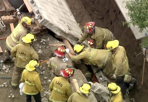 1 dead after being trapped under concrete wall in Pacoima