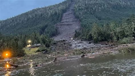 1 girl found dead and 5 still missing after large Alaska landslide