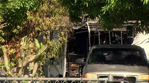 1 hospitalized after trailer behind Homestead home catches fire