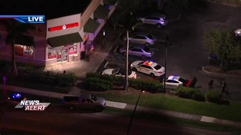 1 in custody, 1 at large after pursuit of suspected robbers ends outside Family Dollar in Pembroke Park