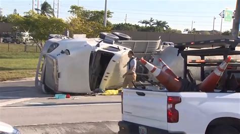 1 injured after cement truck causes temporary closures on SR 836 exit ramp