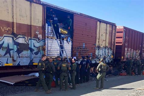 1 migrant found dead in train boxcar, 3 hospitalized