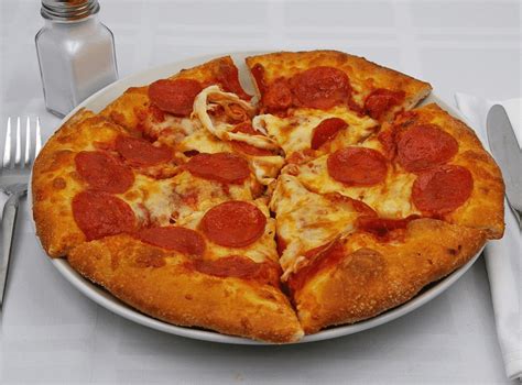 10 inch pizza. A 10-inch pizza is a small pizza, typically intended for one to two people. The number of pieces in a 10-inch pizza will depend on how you cut it. If you cut it into a traditional pie-shaped slice, you can expect to get 6 slices. However, if you prefer smaller pieces, you can cut the pizza into smaller squares and get around 8 pieces. 