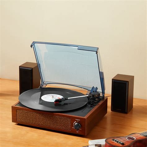 10 inch vinyl record player. .  Versatile 3-Speed Turntable: Enjoy the ability to ...