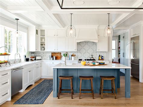 This whitewashed wood island with a marble top is the kitchen MVP. Designer Ellen Kavanaugh optimized it with extra outlets on the side to help when someone's working from the barstool and needs a .... 
