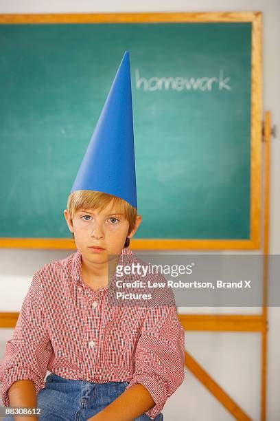 109 Kid With A Dunce Cap Premium High Res Photos