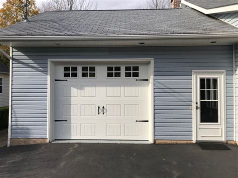 10x8 garage door. Features. OVERHEAD type door with carriage house designs. 3-layer insulated door = steel + insulation + steel. 27 gauge interior and exterior steel. 1-3/8" polystyrene insulation core bonded to steel. 6.48 R-value (thermal protection) Lifetime limited warranty on the paint and finish. 3 year hardware warranty. 