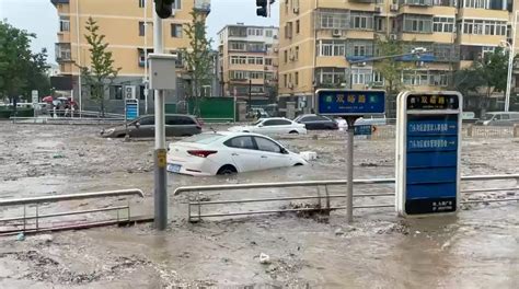11 dead and 27 missing in flooding around Beijing after days of rain, Chinese state media report