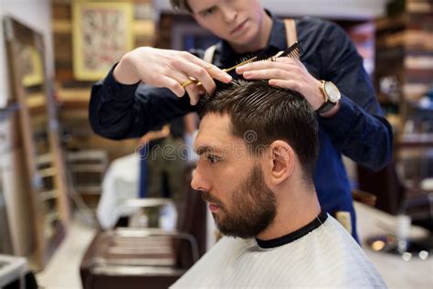 12,001 Barber Cutting Hair Premium High Res Photos