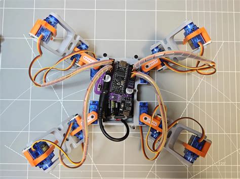 12 servo quadruped robot.  Self-designed Arduino Nano servo expansion board with ...