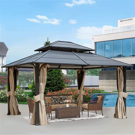 12x14 hardtop gazebo costco. The Wood Gazebo with Aluminum Roof adds character to any area, creating the perfect setting for all your outdoor entertainment needs. The stunning design features a Montana bronze aluminum roof, 6 in. x 9 in. posts finished with classic plinths, and sleek curved gussets. 