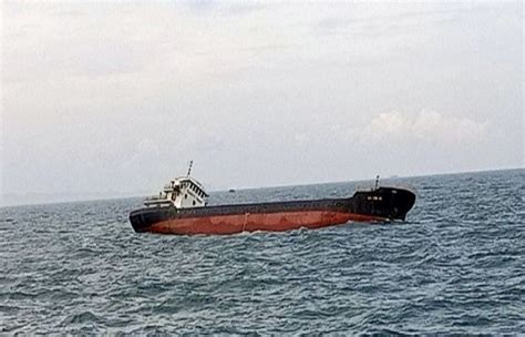 13 crew members missing after a cargo ship sinks off a Greek island in stormy seas