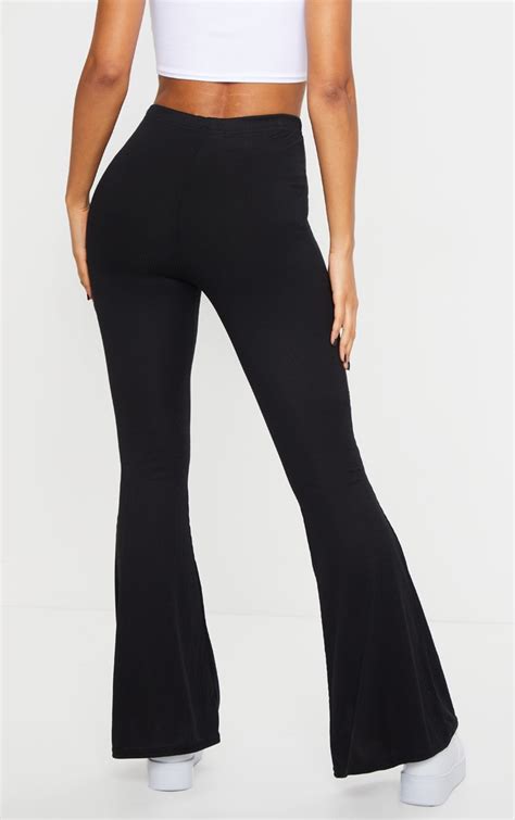 14 Black Flare Pants to Wear Instead Of Leggings - The Chic Pick