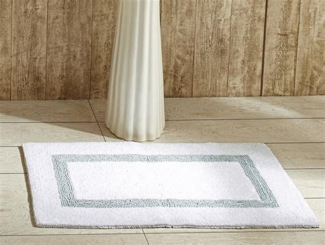 Dimensions (L x W) 17 x 24 inches: Thickness: 1.2 inches: Material : Polyester, PVC: Options: ... Any classic tone-on-tone border rug adds a focal point to any room—bathroom included. This one ...