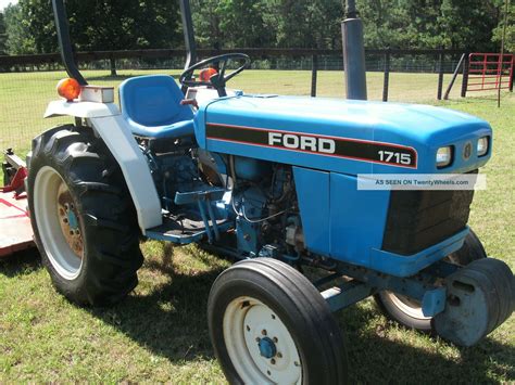 1715 Ford Tractor - New Holland Operator