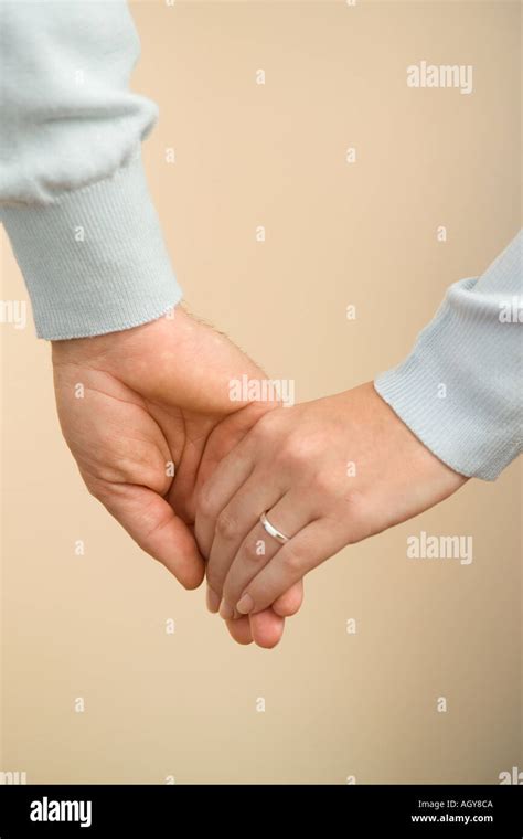 18,928 Husband Wife Holding Hands Premium High Res Photos