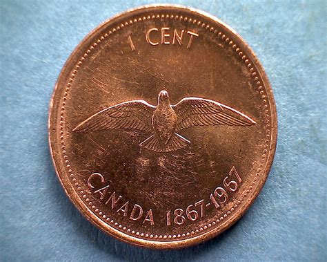 1867 - 1967 Canada Centennial Big Penny Souvenir. In Good Condition, s ee picture for grading. Approximately 37mm in size. I have not been a coin collector for many years, but I recently was given a...from 6135864. 