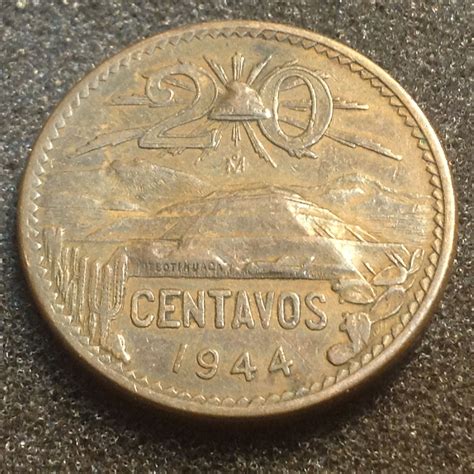 There is a Type 1 and a Type 2 of the 1944 coin. Type 2 shows a plain or a weak showing of the grooves in the mountain on the obverse of the coin at 3:00. The strong or Type 1 shows strong grooves along the mountainside (the Mayon volcano). Called verticle striations. . 