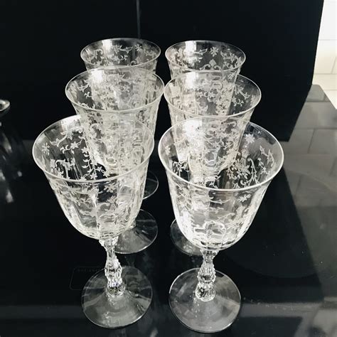 Vintage Fostoria Crystal Tall Sherbert/Champagne Glasses. Beautiful Ballet pattern. Great shine that reflects light. This is for 7 Glasses. Approximately 4 7/8 Height …. 
