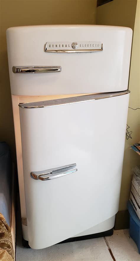 1950 ge refrigerator. Note: The video features a French-Door refrigerator; however, the handle installation is similar to the Side-by-Side refrigerator handles. Plastic or Painted (Colored) Handles: Handles with an end Cap (over each end of the handle): Carefully pop off the cap. Use a small, thin screwdriver at the side edge of the cap. Tighten the bolt under the cap. 