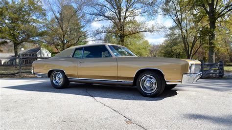The 1970 Monte Carlo brochure reads as follows for the SS454 model: Monte Carlo SS454 includes a 360-hp Turbo-Jet 454 V8, Automatic Level Control, G70 x 15 wide-oval white stripe tires with 7”-wide rim wheels, heavy duty chassis components and SS exterior identification. 1970 SS454 1971 SS454. Exterior Identification. The Monte Carlo SS454 .... 