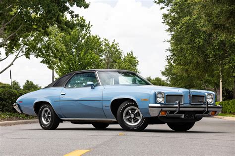 characteristic dimensions: outside length: 5268 mm / 207.4 in, width: 1974 mm / 77.7 in, wheelbase: 2845 mm / 112 in. reference weights: base curb weight: 1661 kg / 3662 lbs , more data: 1973 Pontiac Le Mans Sport Coupe 250-1 Six Turbo Hydra-Matic (aut.. 
