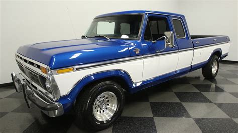 RARE & HIGHLY OPTIONED, MARTI REPORT, 460 V8, AUTO, R134 AC, PS, PB, SLICK PAINT. This tidy and well-documented 1977 Ford F-150 Ranger XLT pickup gets things right where it matters: a strong V8, air conditioned cab, great new color combination, and usability that even goes beyond the enhanced practicality of a rarely seen back seat.. 