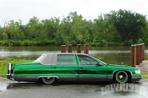 1995 Cadillac Sedan Deville Lowrider. One off custom cross laced 14 powder coated wire rims and newer white wall tires. Custom interior including.. 