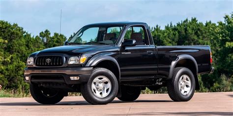 1st gen toyota tacoma. The base model 2014 Toyota Tacoma has a curb weight of 3,765 pounds, states the company’s official website. Additional options, such as a larger engine or extended cab, increase th... 
