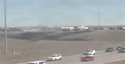 2 brush fires spark along I-70 near Denver International Airport