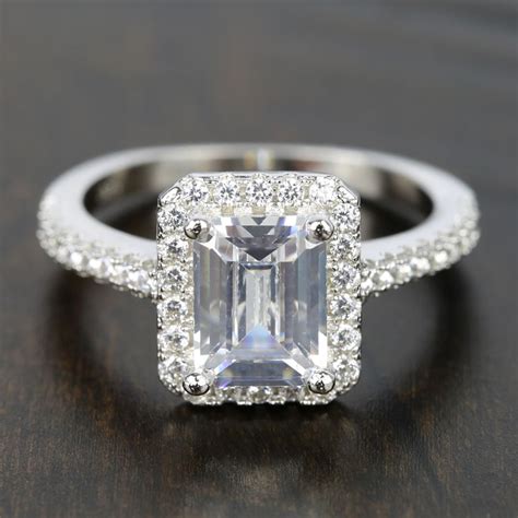 2 carat emerald cut diamond ring. Experience the unparalleled elegance of the Platinum and Diamond Solitaire Ring, a remarkable piece that epitomizes timeless beauty and sophistication. 