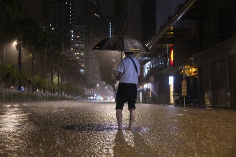 2 dead in Hong Kong amid extreme rain and flash floods that also struck southern China