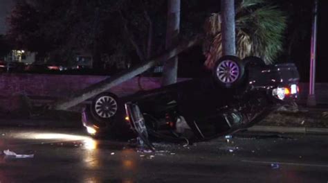 2 hospitalized after car crashes into palm tree, bursts into flames in Kendall