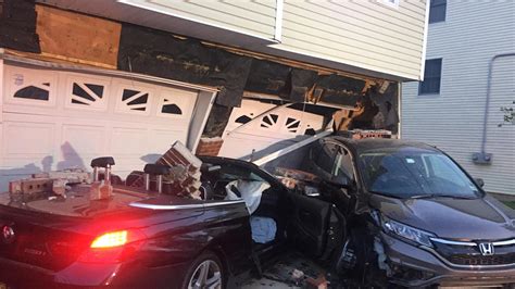 2 injured after vehicle collides with home in Westchester neighborhood