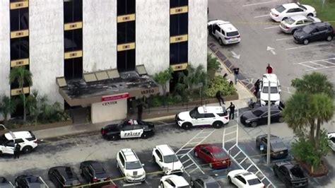 2 killed after exchanging gunfire at bank building in Miami Gardens, police say