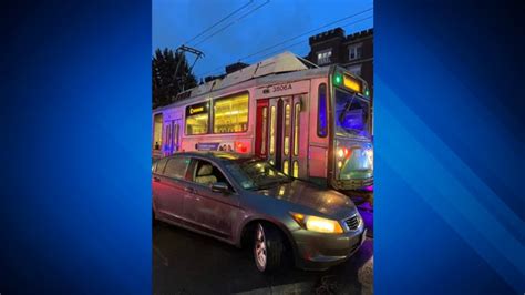 2 people injured, delays reported after car and MBTA Green Line trolley collide in Brookline