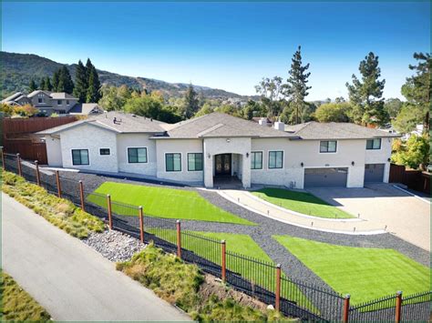 2-year-old estate home on 1 acre with more than 6,686 square feet and primarily single-story living