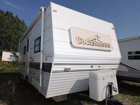The RV for sale is a Used 3900 Coachmen Catalina 