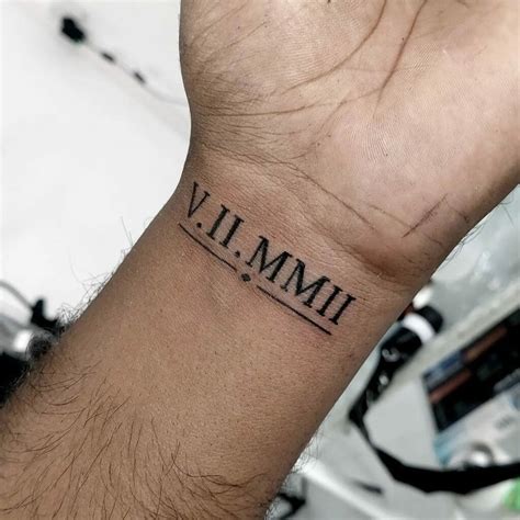 2004 Roman numerals Roman numeral tattoos, Hand tattoos for guys