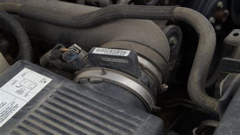 The mass air flow sensor is located right after a car’s air filter along the intake pipe before the engine. The sensor helps a car’s computer determine how much fuel and spark the engine should be outputting.. 
